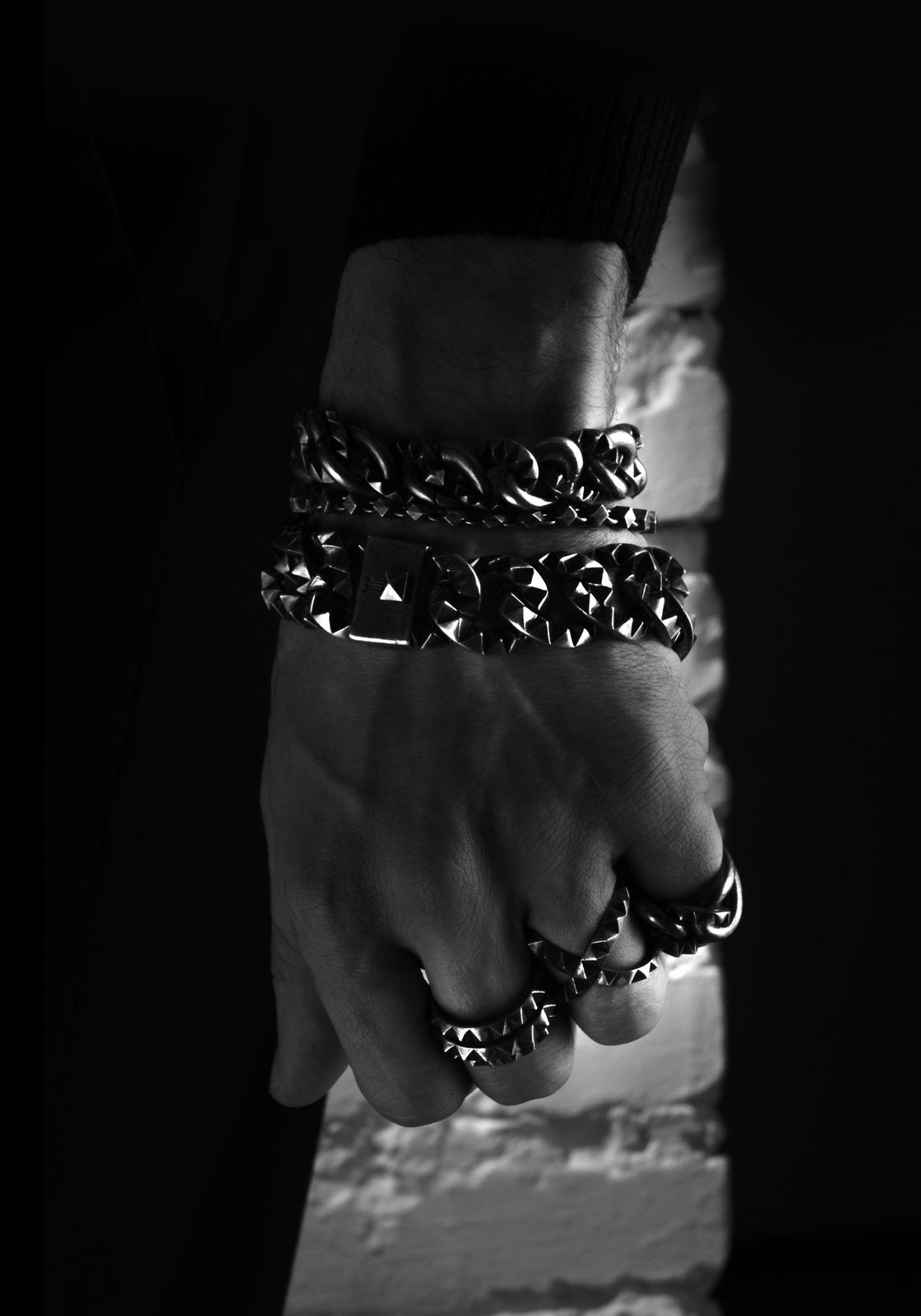 LEONY bracelets and rings on the hand