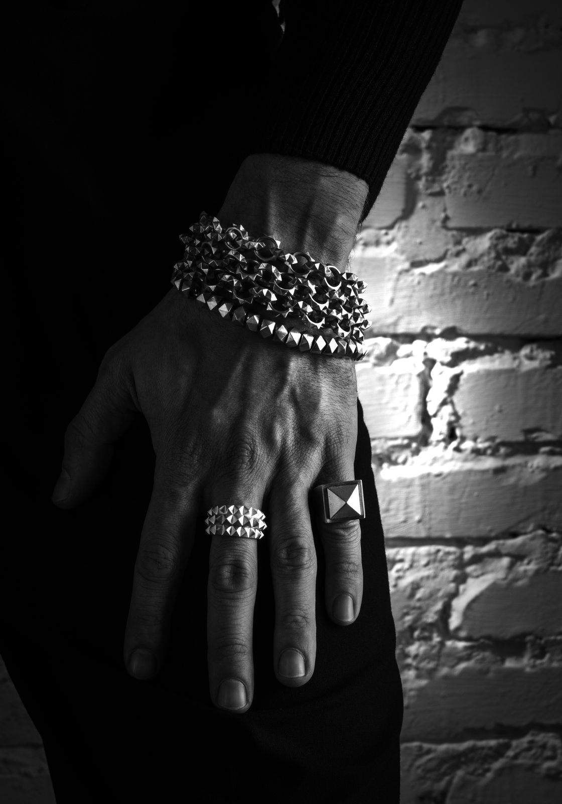 LEONY bracelets and rings, worn